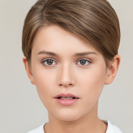 Neutral white young-adult female with short  brown hair and brown eyes