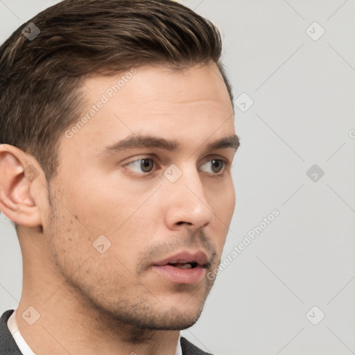 Neutral white young-adult male with short  brown hair and brown eyes