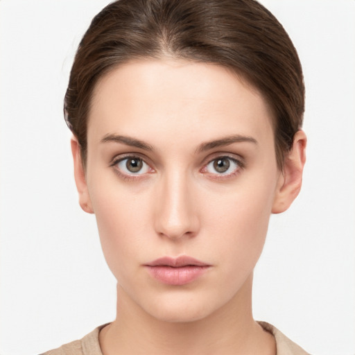 Neutral white young-adult female with short  brown hair and brown eyes