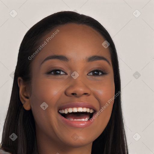 Joyful latino young-adult female with long  black hair and brown eyes