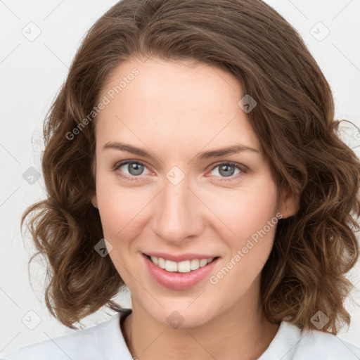 Joyful white young-adult female with medium  brown hair and green eyes