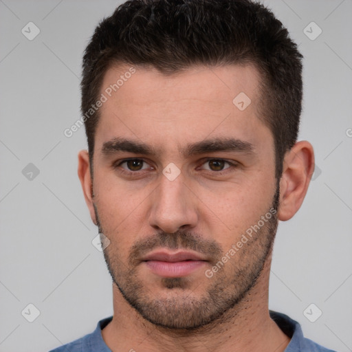 Neutral white young-adult male with short  brown hair and brown eyes