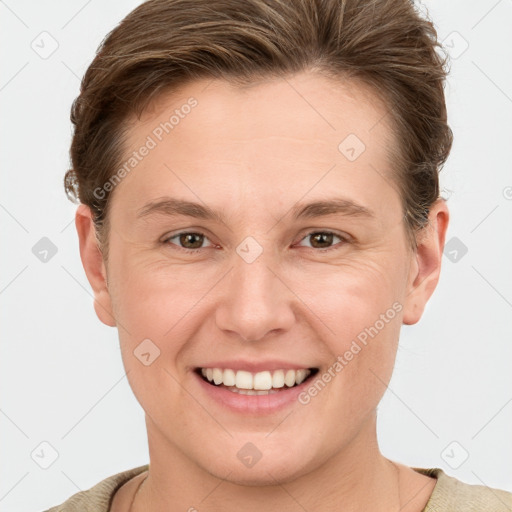 Joyful white young-adult female with short  brown hair and grey eyes