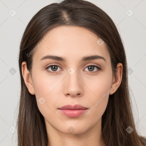 Neutral white young-adult female with long  brown hair and brown eyes