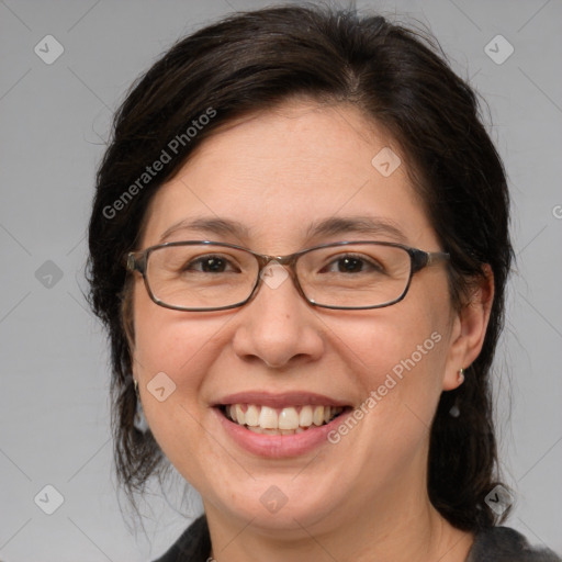 Joyful white adult female with medium  brown hair and brown eyes