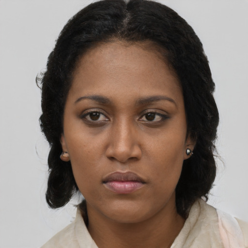 Neutral black young-adult female with long  black hair and brown eyes