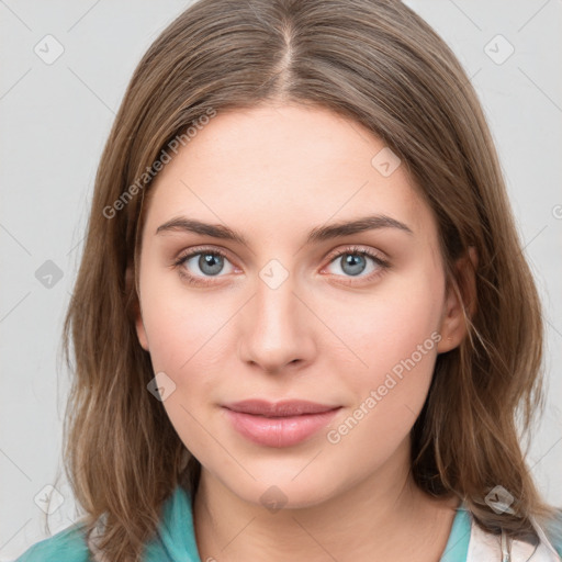 Joyful white young-adult female with medium  brown hair and blue eyes