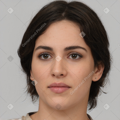 Neutral white young-adult female with medium  brown hair and brown eyes