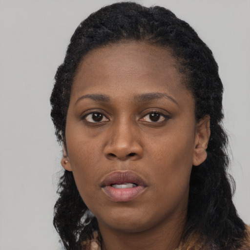 Neutral black young-adult female with long  black hair and brown eyes