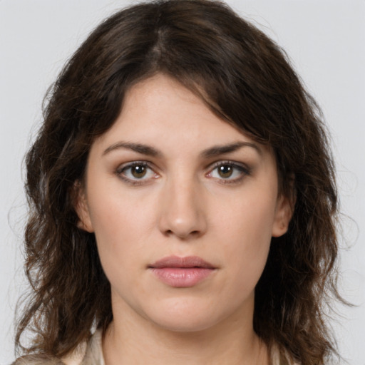 Neutral white young-adult female with medium  brown hair and brown eyes