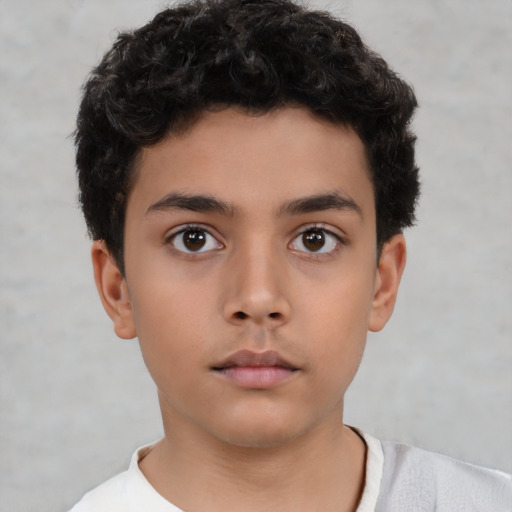 Neutral latino child male with short  black hair and brown eyes