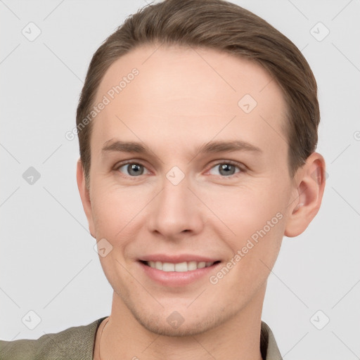 Joyful white young-adult female with short  brown hair and grey eyes