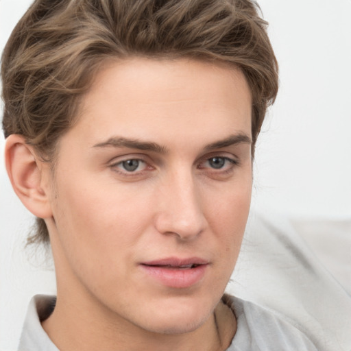 Neutral white young-adult male with medium  brown hair and brown eyes