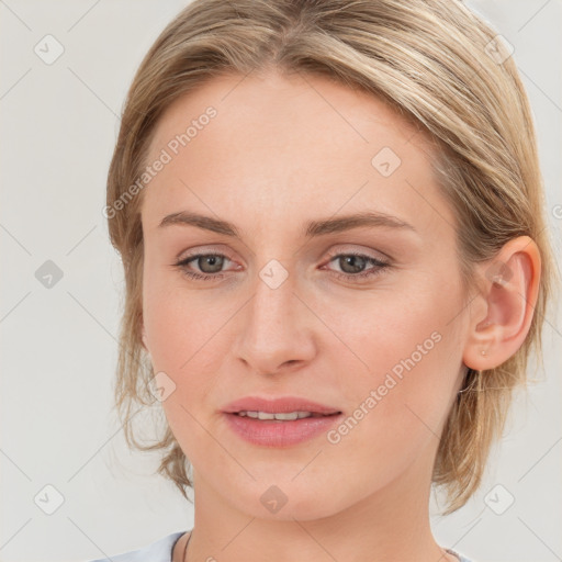 Joyful white young-adult female with medium  brown hair and blue eyes