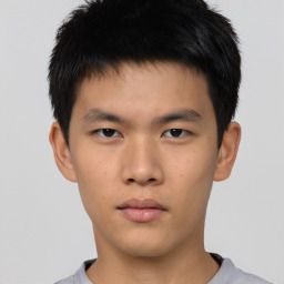 Neutral asian young-adult male with short  brown hair and brown eyes