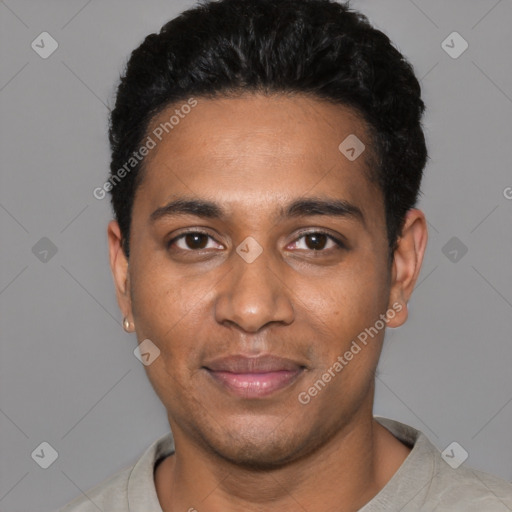 Joyful black young-adult male with short  black hair and brown eyes