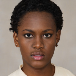 Neutral black young-adult female with short  black hair and brown eyes