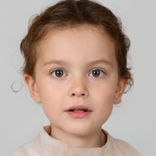 Neutral white child female with short  brown hair and brown eyes