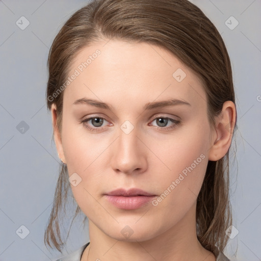 Neutral white young-adult female with medium  brown hair and grey eyes