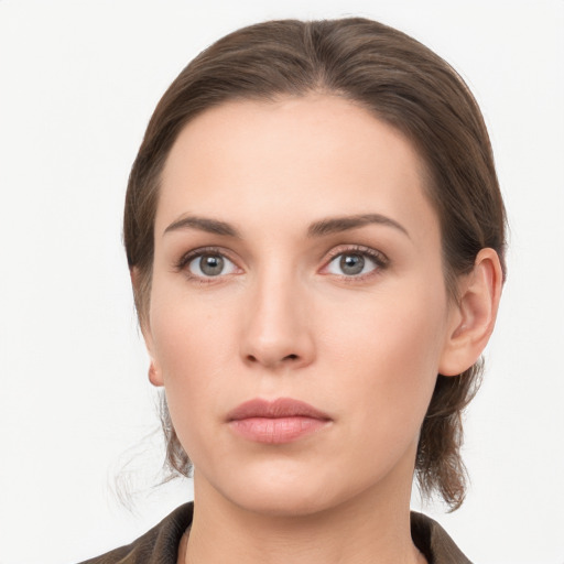 Neutral white young-adult female with medium  brown hair and brown eyes