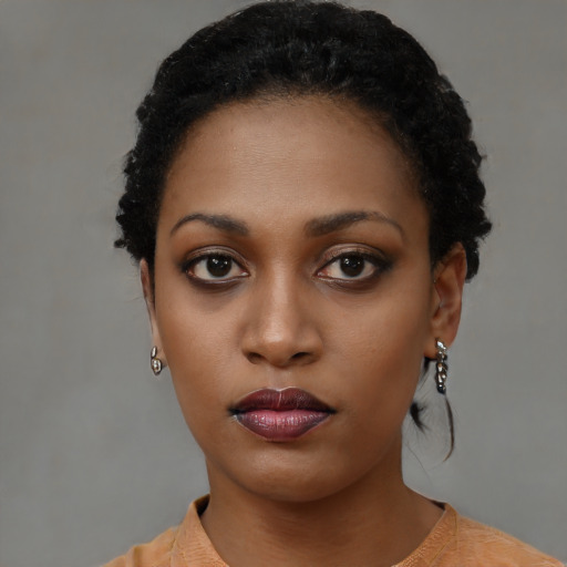 Neutral black young-adult female with short  black hair and brown eyes