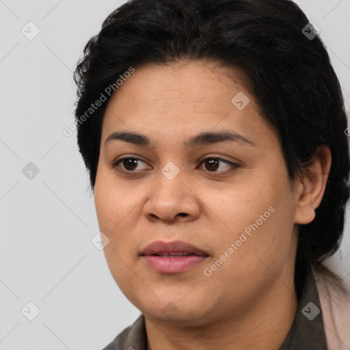 Joyful latino young-adult female with short  black hair and brown eyes