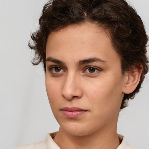 Neutral white young-adult female with medium  brown hair and brown eyes