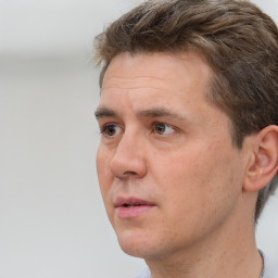 Neutral white adult male with short  brown hair and brown eyes