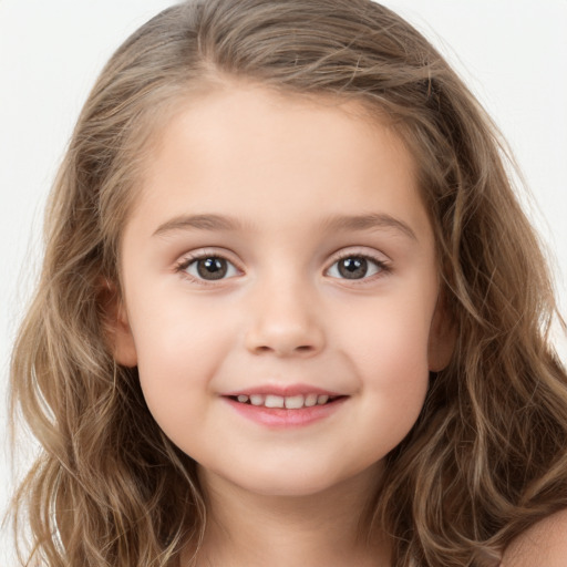 Joyful white child female with long  brown hair and brown eyes