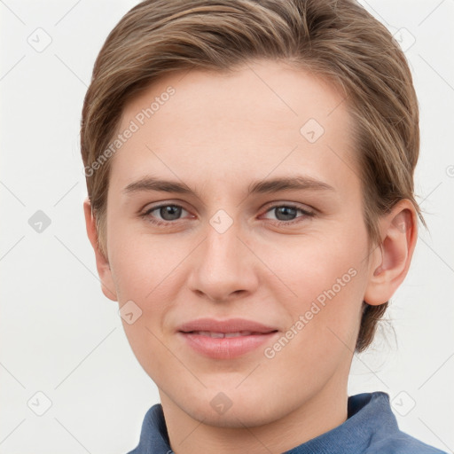 Joyful white young-adult female with short  brown hair and grey eyes