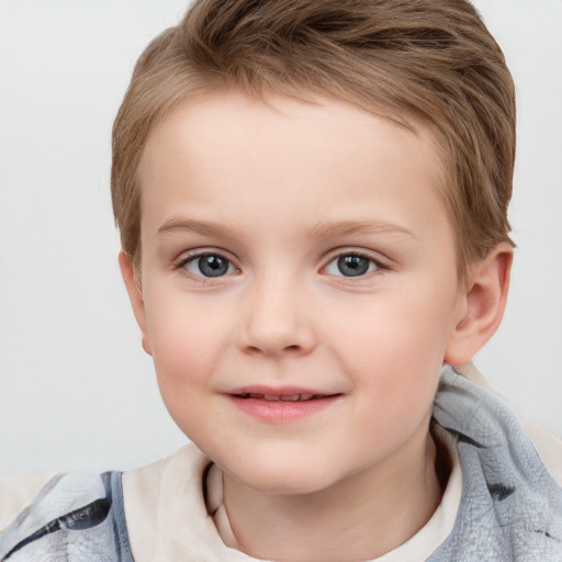 Joyful white child female with short  brown hair and grey eyes