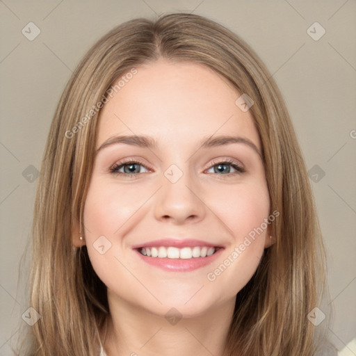 Joyful white young-adult female with long  brown hair and green eyes