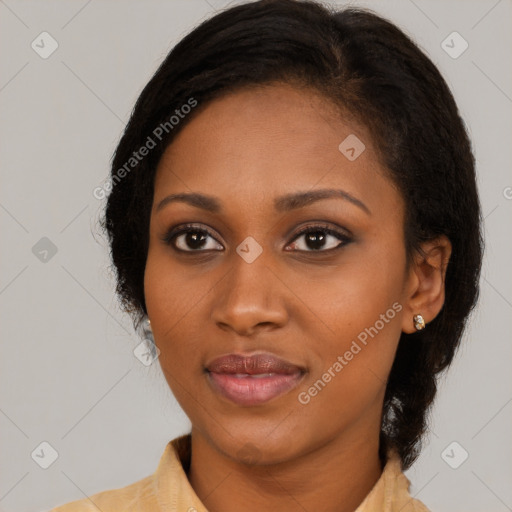 Joyful black young-adult female with medium  brown hair and brown eyes