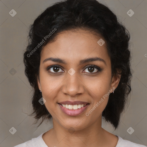 Joyful black young-adult female with medium  brown hair and brown eyes