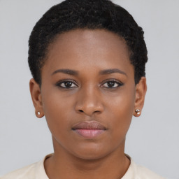 Neutral black young-adult female with short  brown hair and brown eyes