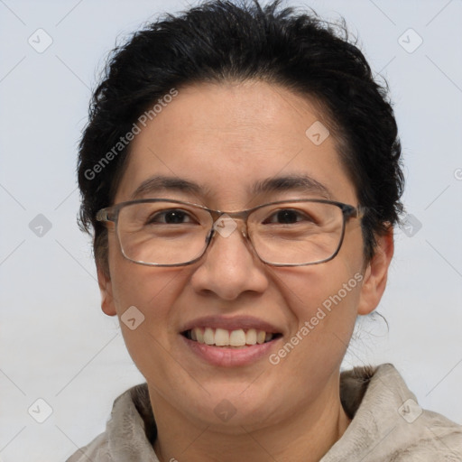 Joyful white adult female with short  brown hair and brown eyes