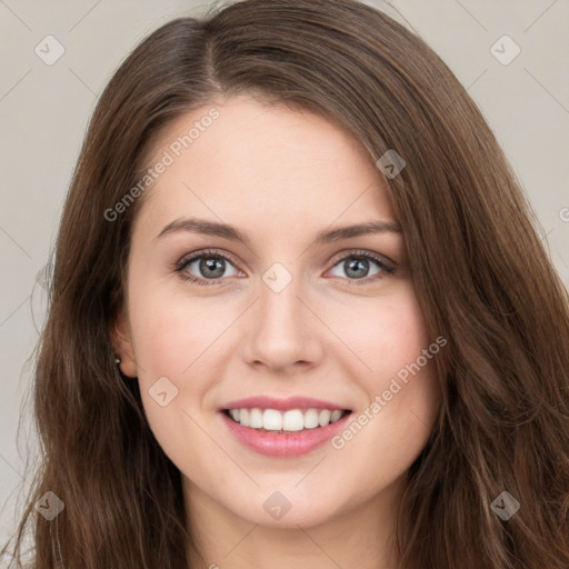 Joyful white young-adult female with long  brown hair and green eyes