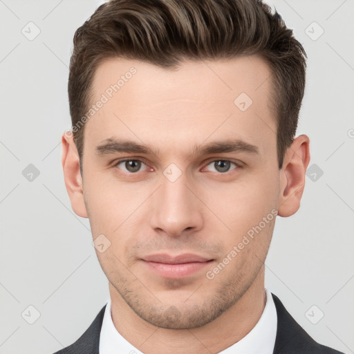 Neutral white young-adult male with short  brown hair and brown eyes