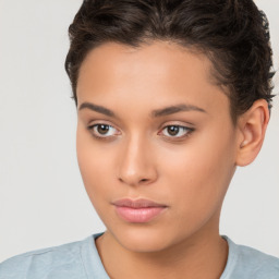 Neutral white young-adult female with short  brown hair and brown eyes