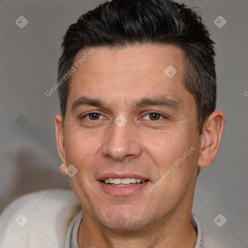 Joyful white adult male with short  brown hair and brown eyes