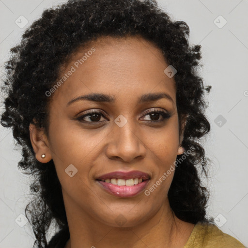 Joyful black young-adult female with long  brown hair and brown eyes