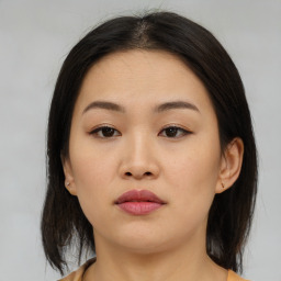 Neutral asian young-adult female with medium  brown hair and brown eyes