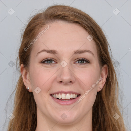 Joyful white young-adult female with long  brown hair and grey eyes