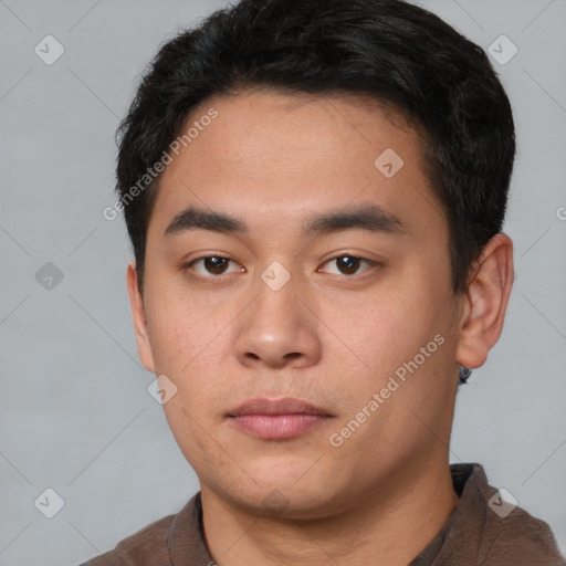 Neutral white young-adult male with short  black hair and brown eyes