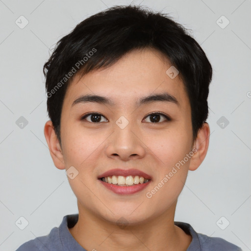 Joyful asian young-adult male with short  brown hair and brown eyes