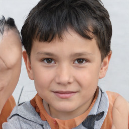 Joyful white child male with short  brown hair and brown eyes