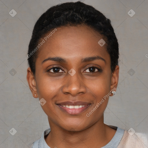 Joyful black young-adult female with short  black hair and brown eyes