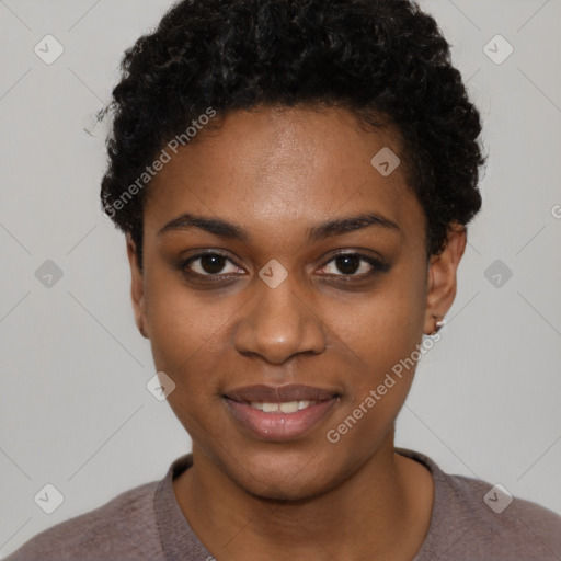 Joyful black young-adult female with short  black hair and brown eyes