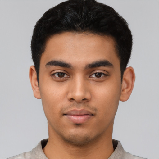 Neutral latino young-adult male with short  black hair and brown eyes