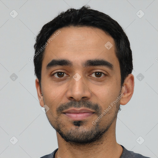Neutral latino young-adult male with short  black hair and brown eyes